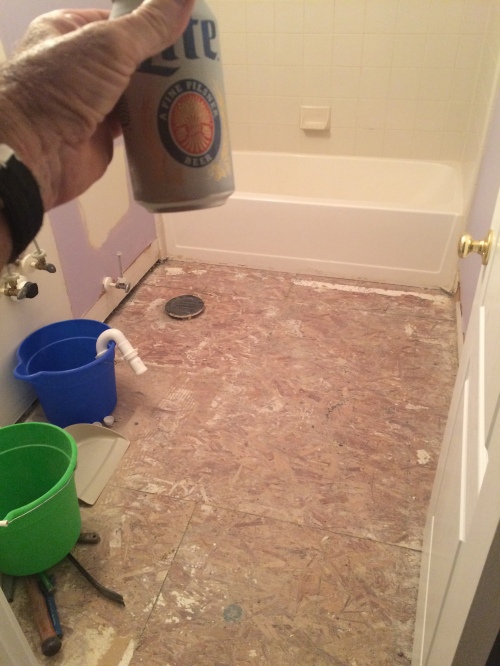 It was finally Miller time after hammering away at old floor tile one chunk at a time. My friend Jody reminded me there are power tools that could've shortened my torture. 